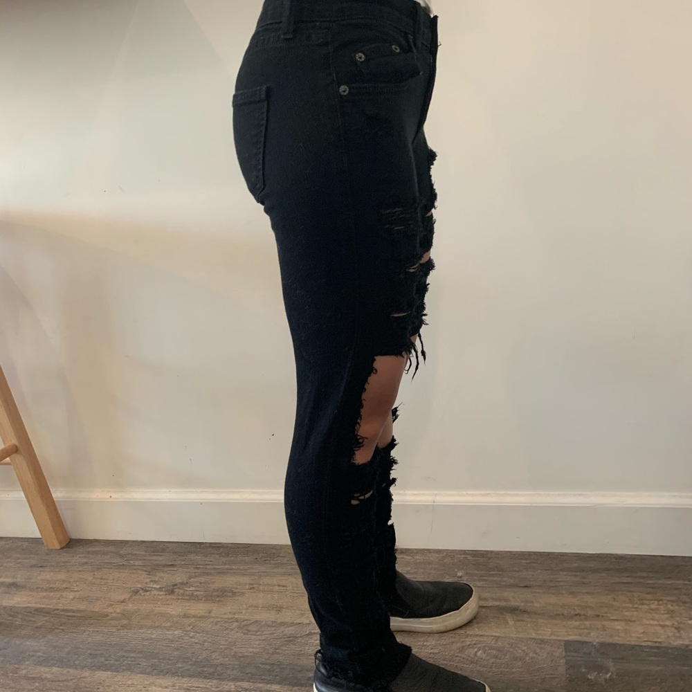 Distressed mid to low waisted denim